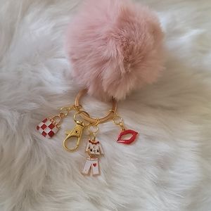 Pom Pom keychain with red and white charms